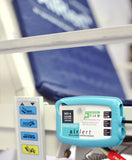 Airlert control box positioned at the foot of an upright bed