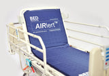 An upright blue Airlert bed