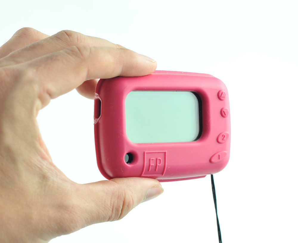 Hand holding a red text pager