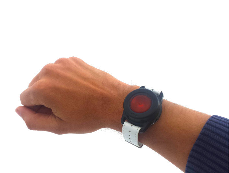 Photo of The Call Button designed to be worn on the wrist, attached with a watch strap